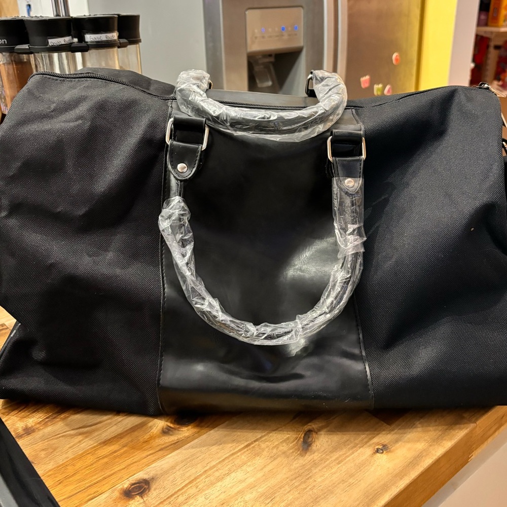 Burberry Fragrance duffel bag